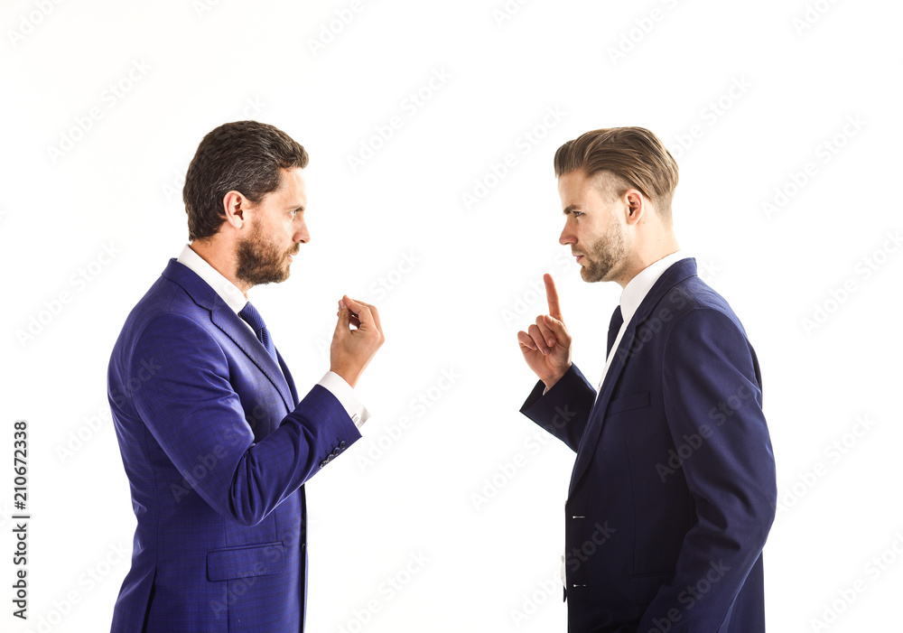 Men in suits or businessmen with tense faces and gestures . Stock Photo ...