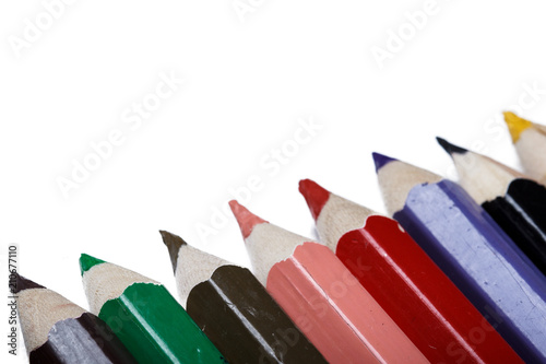 School pencils close-up on a white background isolate photo