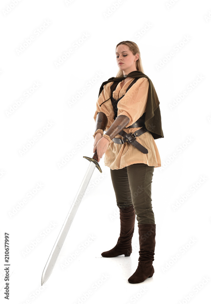 full length portrait of girl wearing brown medieval costume,. standing pose, isolated on white studio background.