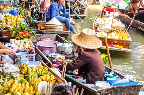 Food and drink sell at Damnoen Saduak floating market in Ratchaburi near Bangkok photo