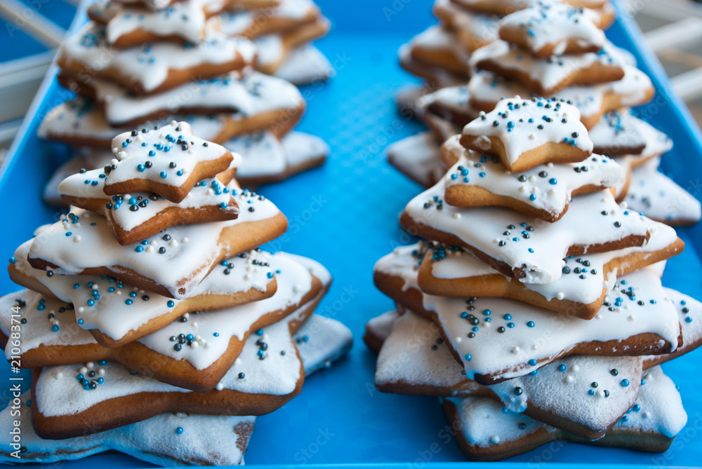 Homemade christmas trees from biscuits and glaze. Symbol of new year. Homemade christmas trees from biscuits and glaze. Symbol of new year.