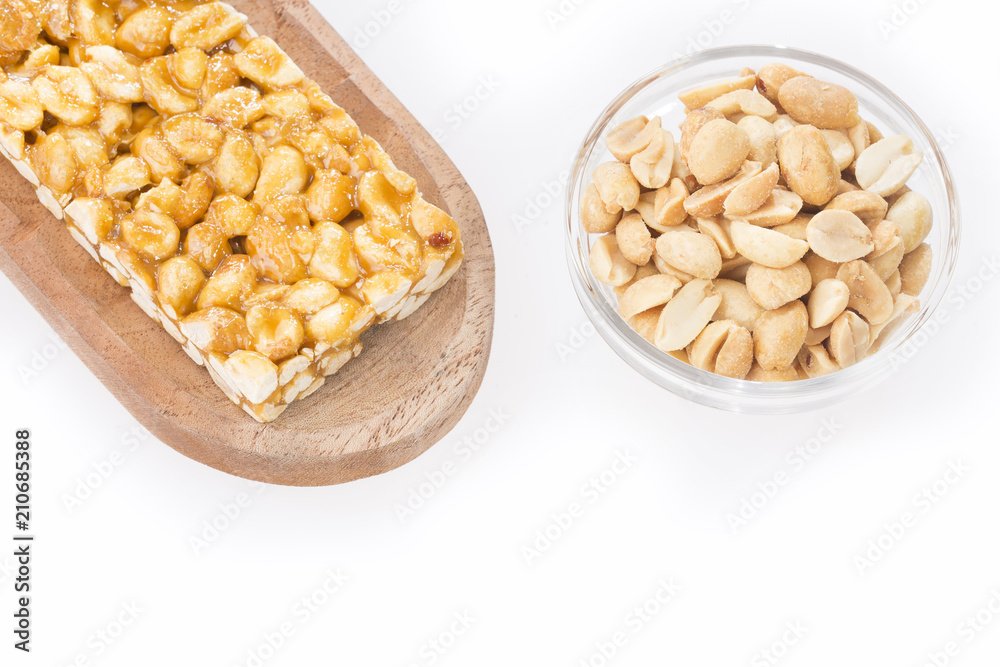 Honey bars with peanuts - white background. Top view Honey bars with peanuts - white background. Top view