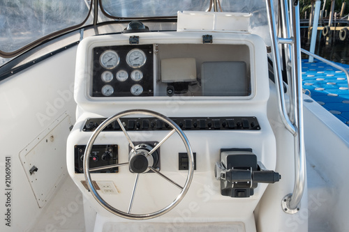 White yacht control panel with steering wheel © Mumemories