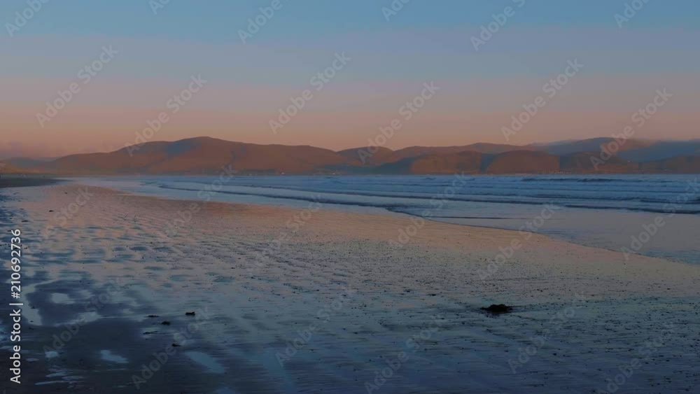 Sunset over Inch Strand - the famous beach at Dingle Ireland Sunset over Inch Strand - the famous beach at Dingle Ireland