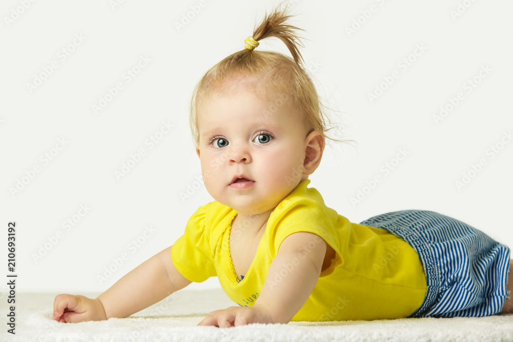 Studio portrait of adorable 6 months old baby girl Studio portrait of adorable 6 months old baby girl