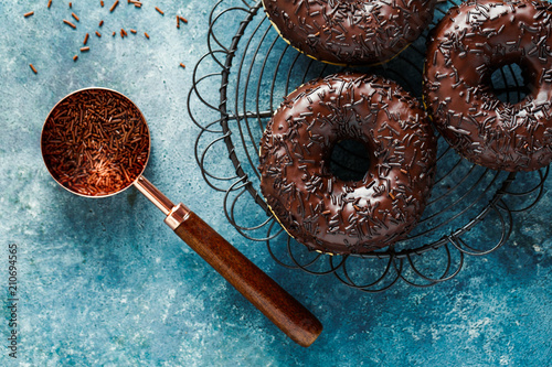 Fresh made Donuts with chocolate glaze and sprinkles.