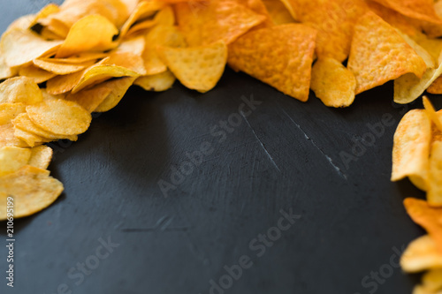 nacho chips food crisp slices black background