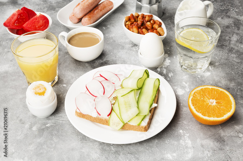 Various healthy breakfast on gray background