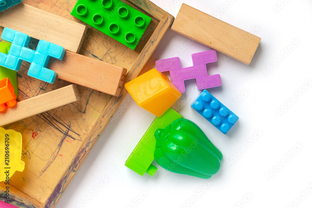 Naklejka premium Toy colorful plastic blocks isolated on white background