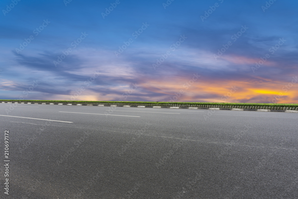 Fototapeta premium Asphalt road and sky cloud landscape