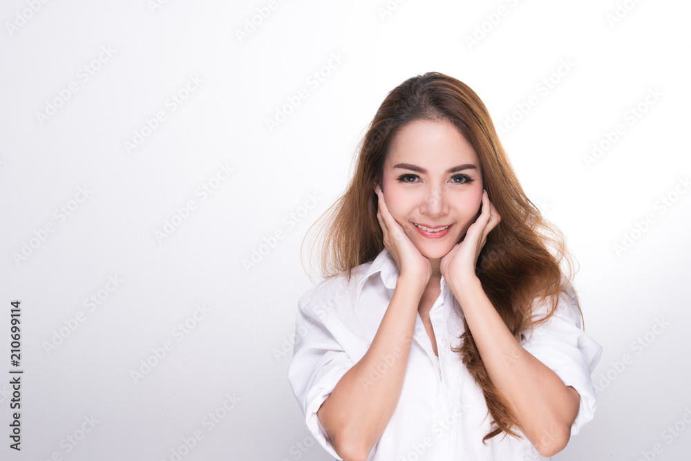 Beautiful asian woman (ages 20-30 years) happy face, smiling face, both hands catching cheek on white background. Beautiful asian woman (ages 20-30 years) happy face, smiling face, both hands catching cheek on white background.