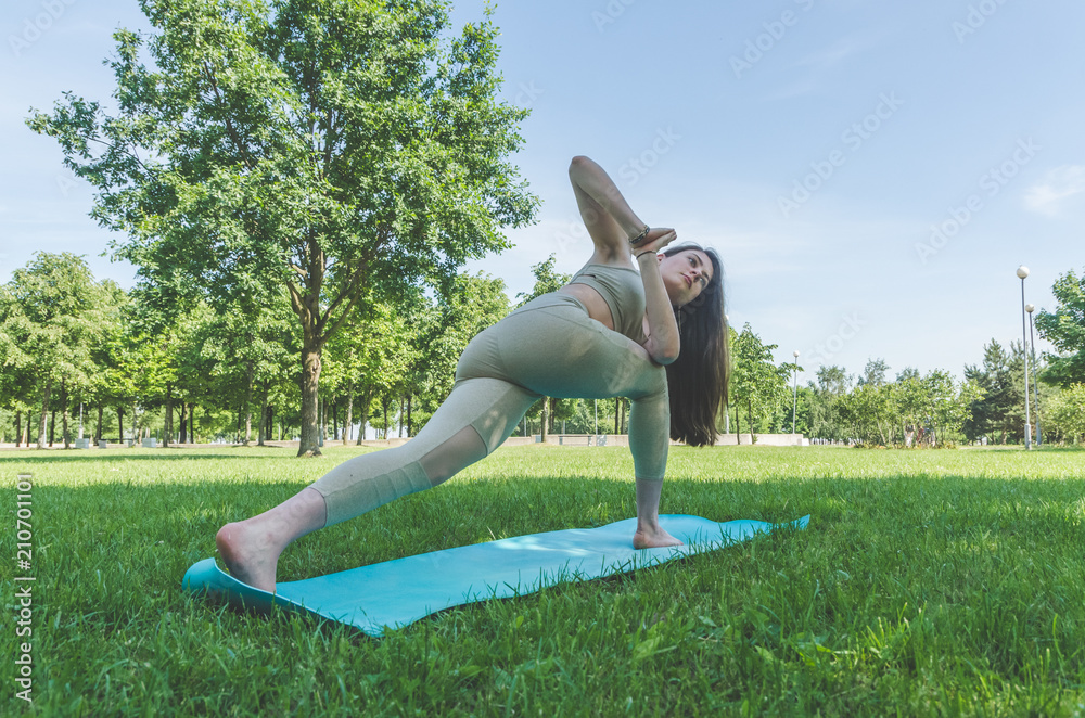 Fototapeta premium the girl doing yoga, doing asanas