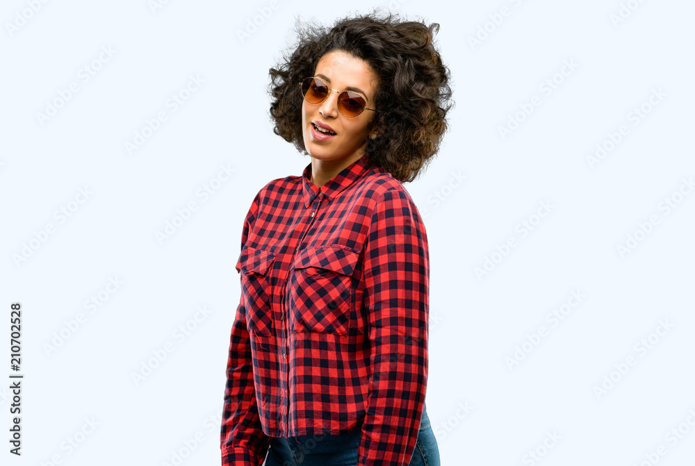 Beautiful arab woman happy and surprised cheering expressing wow gesture Beautiful arab woman happy and surprised cheering expressing wow gesture