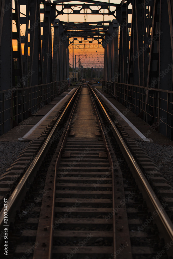 steel railway bridge on sunset steel railway bridge on sunset