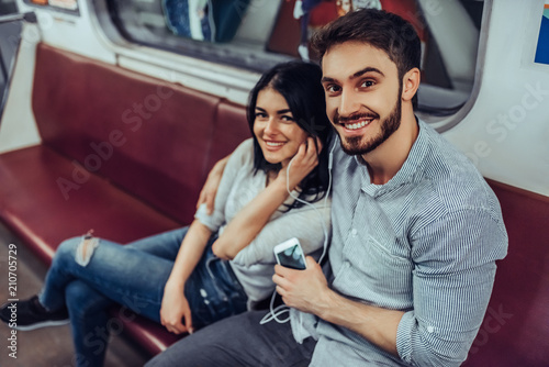 Young romantic couple in subway