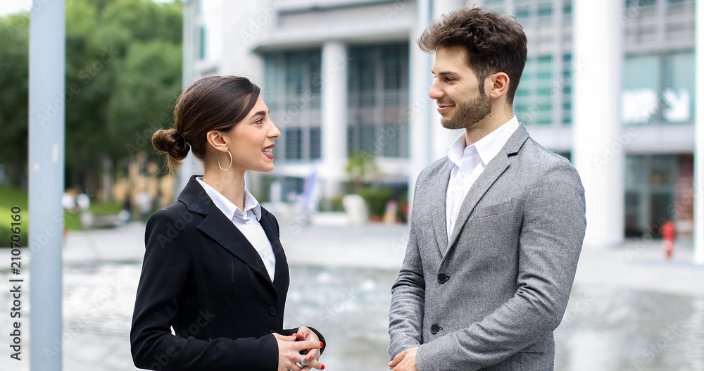 Business partners discussing together Business partners discussing together