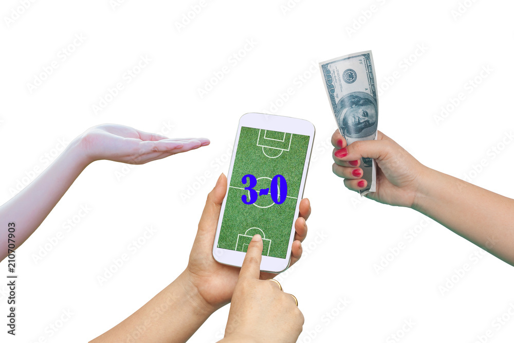 Men hold Mobile to play Football Betting online . Men hold Mobile to play Football Betting online .