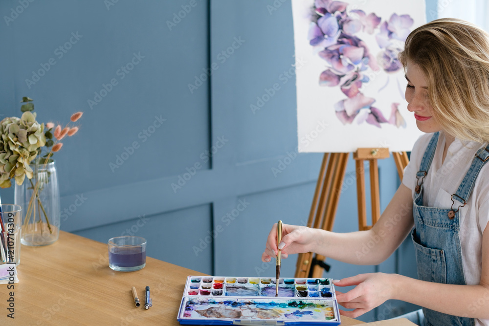 Fototapeta premium painting art classes. inspiration imagination. drawings creation. artist creating a watercolor painting