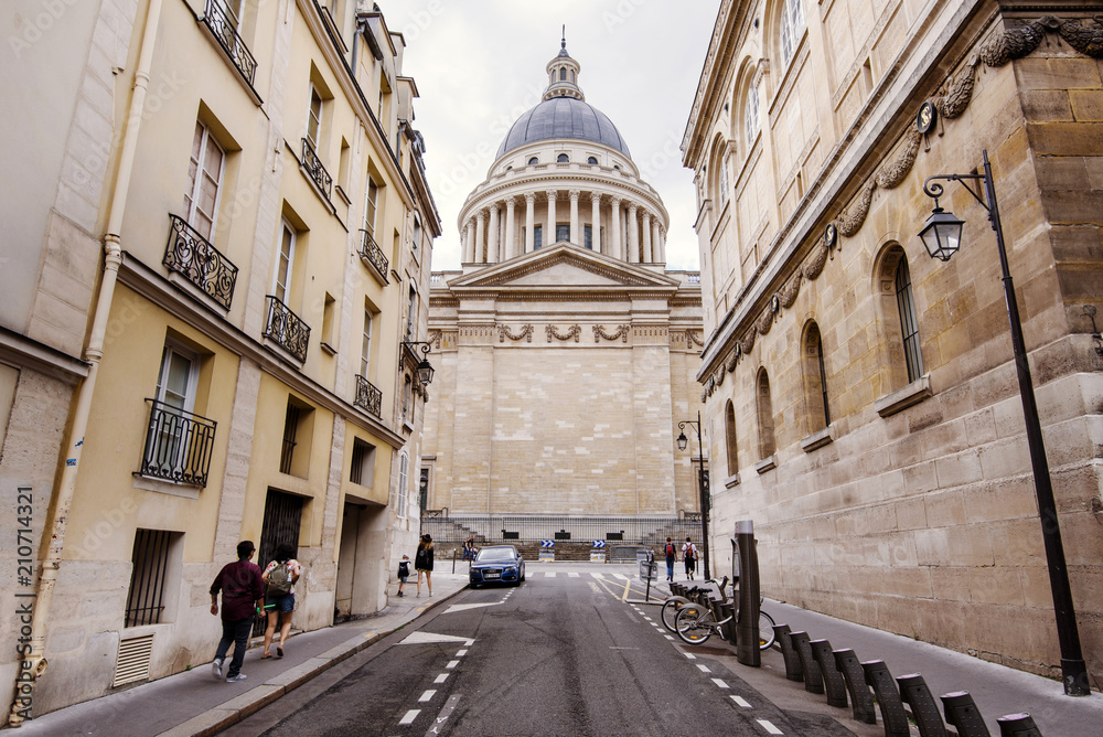 Paris, France - August 13, 2017. View from Paris street to Pantheon mausoleum dome in Latin quarter. Popular landmark built in early neoclassicism architectural style.