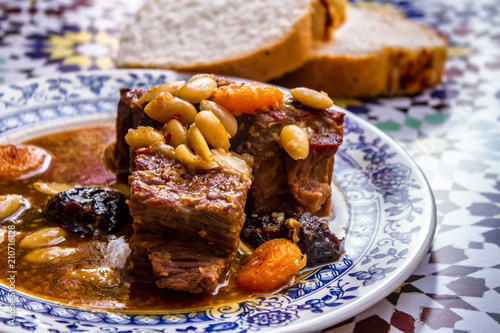 Obraz na płótnie Moroccan beef, prunes and almonds tagine