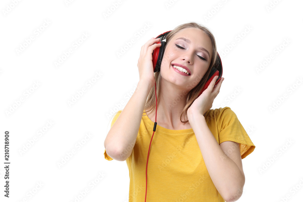 Young woman with headphones on white background Young woman with headphones on white background