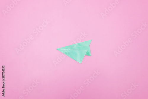 illustration photo of a paper plane on pink background