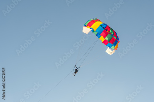 Skydiver on the sky background