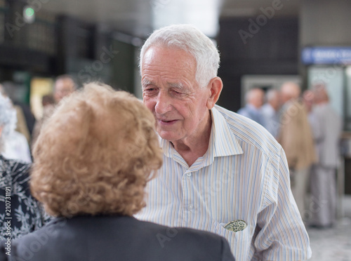 Senior man and woman talking