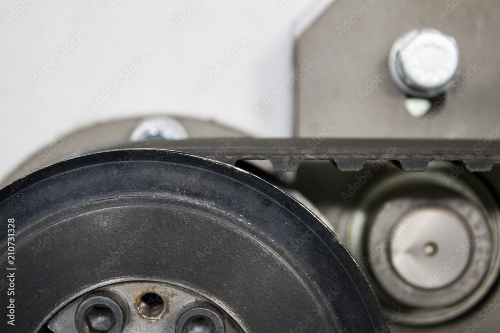 Part of ferrous pulley of strap transmission of mechanism of machine-tool.. Part of ferrous pulley of strap transmission of mechanism of machine-tool..