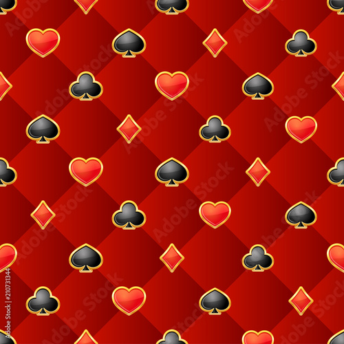 Seamless pattern with playing card suits on burgundy background