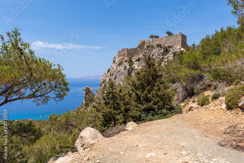 The castle of Monolithos located at the summit of the tall and craggy rock. Rhodes island, Greece