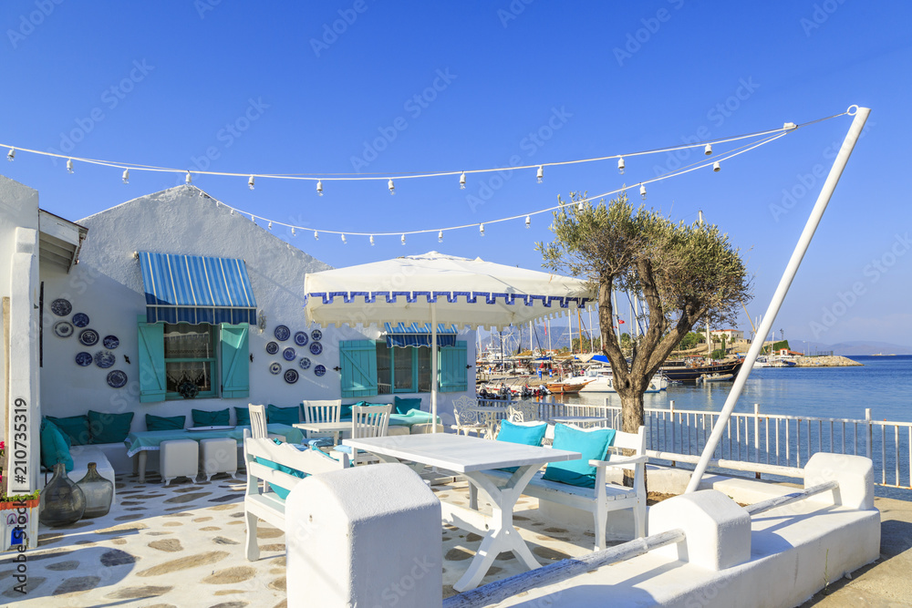 Fototapeta premium Turquoise colored house near seaport of Datca, Turkey