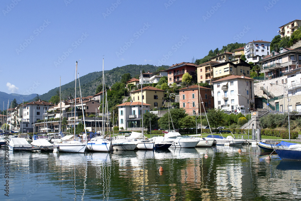 .Lake with boats on the water. Beautiful landscape in Italy with boats on the water.