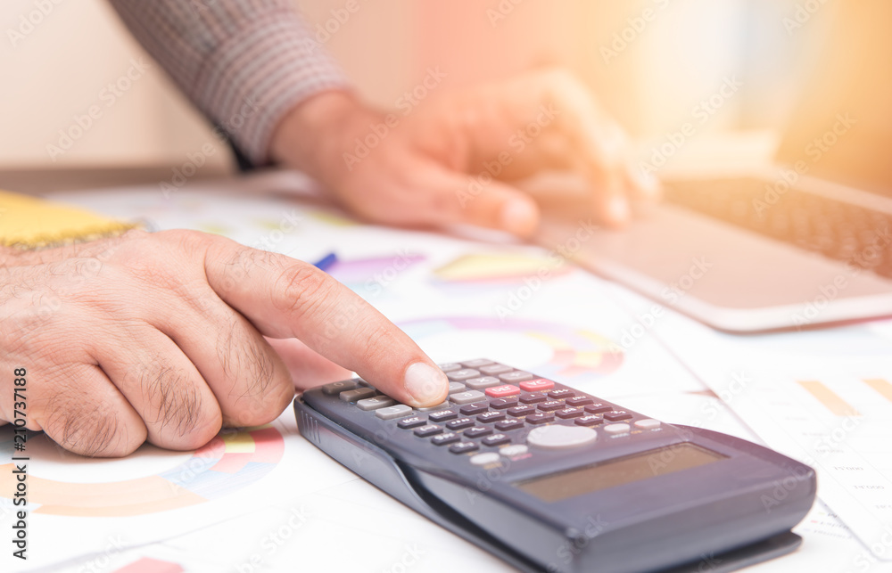 Businessman making some calculation