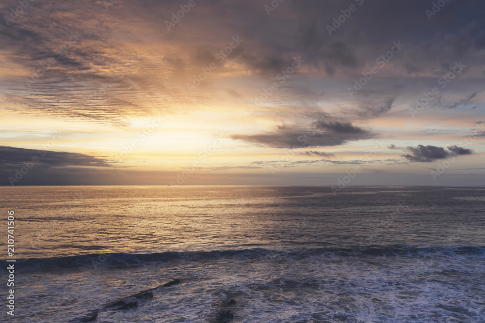 Sunlight sunset on horizon ocean on background seascape atmosphere rays sunrise. Relax view waves sea on evening sand beach, sun light flare nature evening outdoor vacation concept