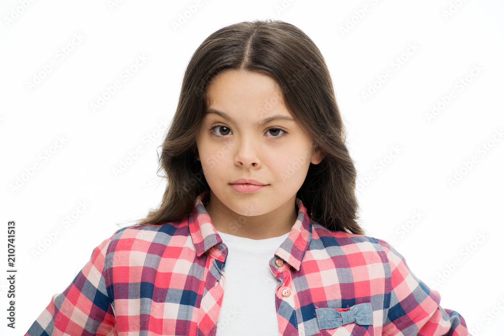 Little girl raise eyebrow isolated on white. Confident child with long brunette hair. Hairdresser salon for development of kid. Hair fashion and skincare. Feel uncertain. Beauty look. Casual in style Little girl raise eyebrow isolated on white. Confident child with long brunette hair. Hairdresser salon for development of kid. Hair fashion and skincare. Feel uncertain. Beauty look. Casual in style