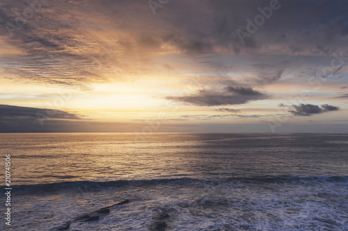 Sunlight sunset on horizon ocean on background seascape atmosphere rays sunrise. Relax view waves sea on evening sand beach  sun light flare nature evening outdoor vacation concept
