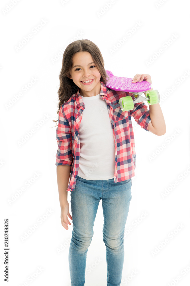 Little child smile with penny board isolated on white. Happy skater girl. Ready to ride. Hipster child is active in summer. Skateboarding is way of life. Active hobby and sport activity Little child smile with penny board isolated on white. Happy skater girl. Ready to ride. Hipster child is active in summer. Skateboarding is way of life. Active hobby and sport activity