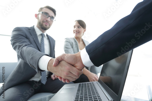 closeup. confident handshake colleagues