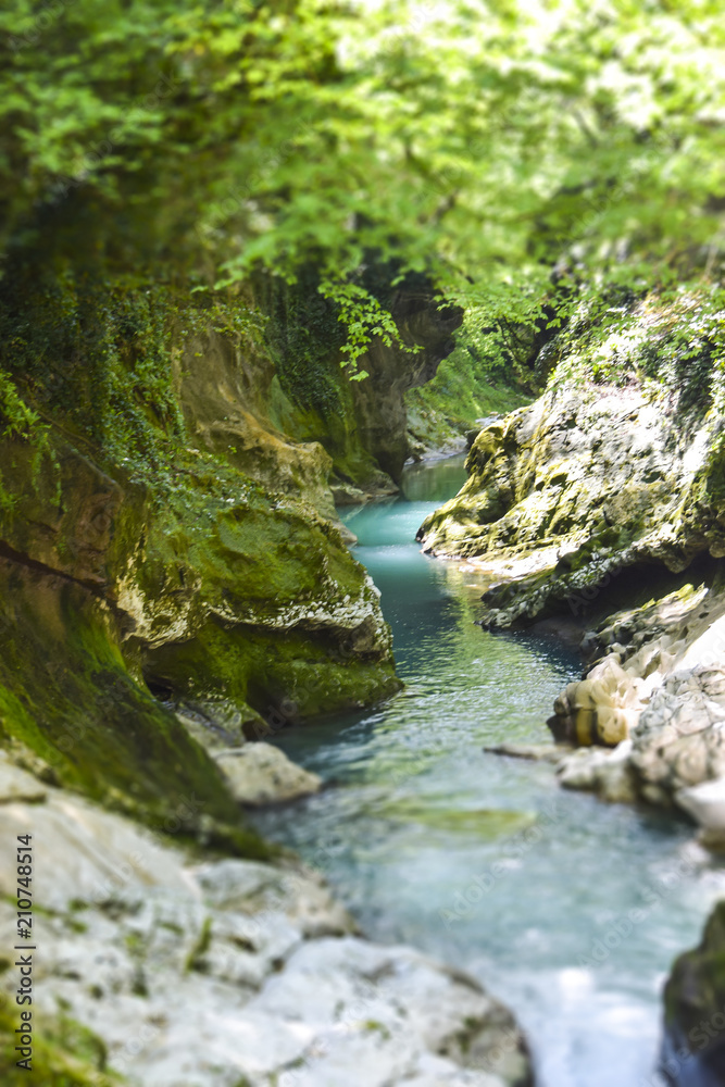tilt shift landscape blue river mountains cliffs greenery wemna summer flow blurred tilt shift landscape blue river mountains cliffs greenery wemna summer flow blurred