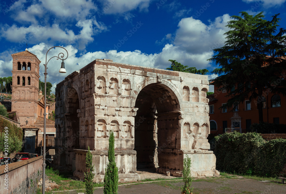 The so called Arch of Janus ruins with clouds in the historic center of Rome