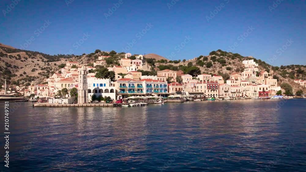 Symy island - Greece - August 2017 - View of Symi Island town by speedboat Symy island - Greece - August 2017 - View of Symi Island town by speedboat