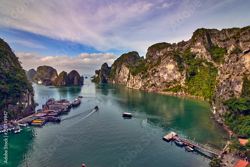 Tourist Junks in Halong Bay,Panoramic view of sunset in Halong Bay, Vietnam, Southeast Asia,UNESCO World Heritage Site