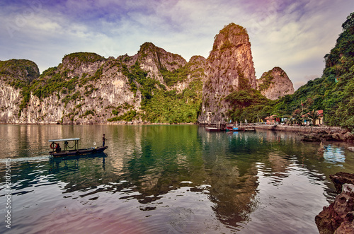Tourist Junks in Halong Bay,Panoramic view of sunset in Halong Bay, Vietnam, Southeast Asia,UNESCO World Heritage Site