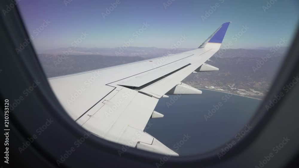 pov, view of wing from plane window pov, view of wing from plane window