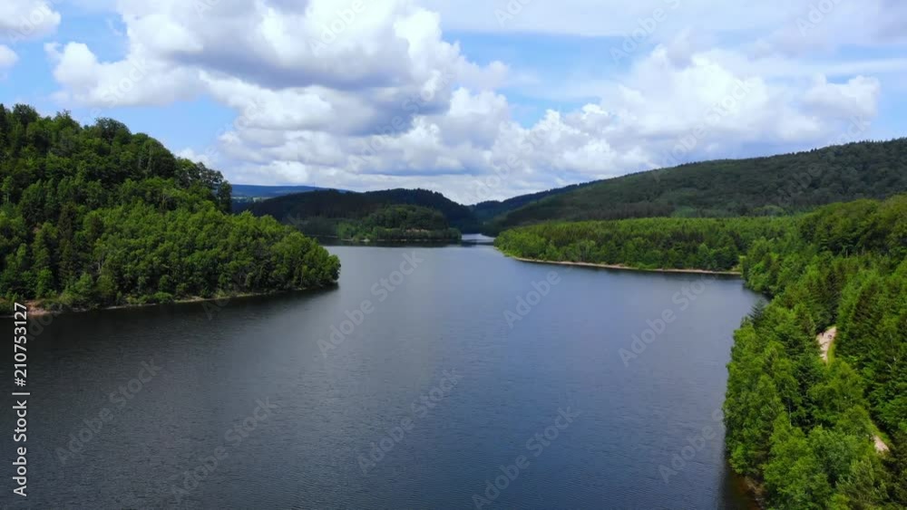 Big lake in the woods - aerial drone flight Big lake in the woods - aerial drone flight