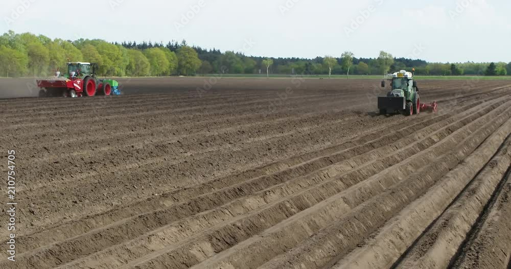 Industrial machinery on dirt field, aerial Industrial machinery on dirt field, aerial