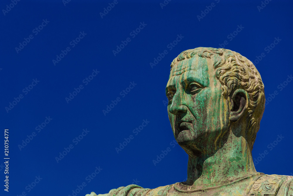 Caesar Augustus Nerva Emperor of Ancient Rome bronze statue in Imperial Forum (with copy space)
