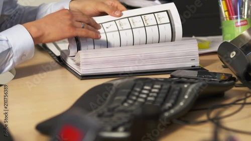 Close up, secretary at office computer