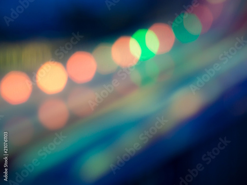 Blurred reflections of colored lights.